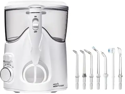 Ирригатор Waterpik WP-160 Ultra Plus импульсн. 7насад. белый